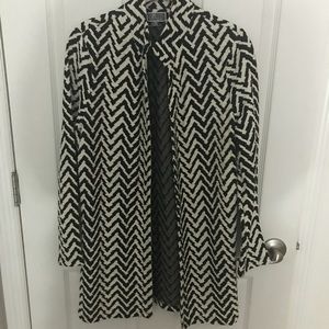 Black and white cute cover up shirt / sweater .